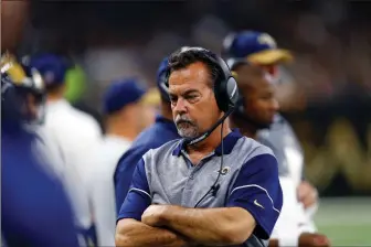  ?? Associated Press ?? In this Nov. 27 file photo, former Los Angeles Rams head coach Jeff Fisher reacts on the sideline against the New Orleans Saints, in New Orleans. Fisher was fired Monday by the Rams. The team’s coach since 2012, Fisher compiled a 31-45-1 record with...