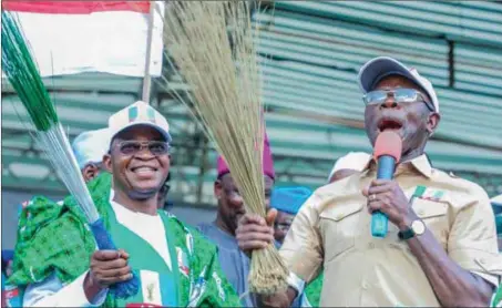  ??  ?? Oyetola and National Chairman of the APC, Adams Oshiomhole during one of their campaigns