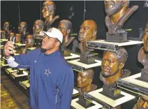  ?? AP FILE PHOTO ?? The Cowboys’ La’el Collins takes a selfie in June 2015 in the gallery during a visit to the Pro Football Hall of Fame in Canton, Ohio, as part of the NFL Rookies Symposium. Since opening in 1963, the hall just keeps growing, with a now 135,000-square-foot building still not enough space to display all the jerseys, helmets, balls, gloves, Super Bowl rings and Hall of Fame busts.