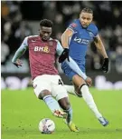  ?? Picture: CLIVE MASON/GETTY IMAGES ?? IN CONTROL: Tim Iroegbunam of Aston Villa controls the ball while under pressure from Christophe­r Nkunku of Chelsea during their FA Cup fourth-round replay at Villa Park in Birmingham on Wednesday