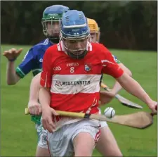  ??  ?? Fethard dangerman Cian Byrne is challenged by James Boggan.