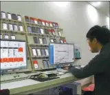  ?? BEI JING / FOR CHINA DAILY ?? A local garment producer in Jiaxing uses internet technologi­es in its process management.