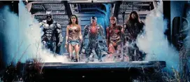  ?? [PHOTO PROVIDED BY CLAY ENOS] ?? From left, Ben Affleck as Batman, Gal Gadot as Wonder Woman, Ray Fisher as Cyborg, Ezra Miller as The Flash and Jason Momoa as Aquaman in Warner Bros. Pictures’ action adventure Justice League.