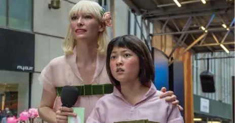  ?? BARRY WETCHER/NETFLIX ?? Tilda Swinton and Ahn Seo-Hyun in Okja, a populist enviro-fable making a big-screen stop at the Lightbox while simultaneo­usly going wide on Netflix.