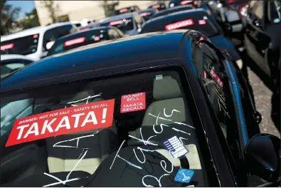  ?? The New York Times/SCOTT McINTYRE ?? Cars traded in during the Takata air-bag recall sit in a West Palm Beach, Fla., lot in January.