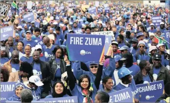  ??  ?? People power... a Da-backed anti-zuma march under way – not as impressive as the march in Venezuela (main picture), but the sentiment’s the same.