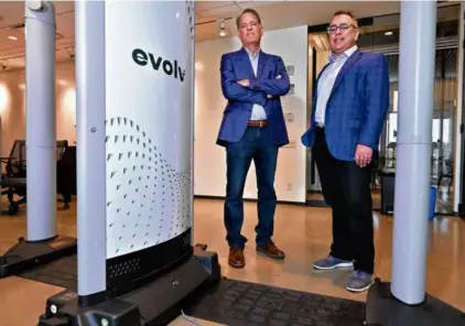  ?? ?? Evolv cofounder Mike Ellenbogen (left, with Anil Chitkara, founder and chief growth officer) said the company’s weapons detectors were created for venues that must handle thousands of visitors quickly.