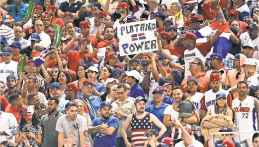  ?? LOGAN BOWLES, USA TODAY SPORTS ?? A raucous crowd filledMarl­ins Park in Miami for Saturday’s USA- Dominican Republic game. The defending WBC champion Dominicans rallied to beat the Americans 7- 5.