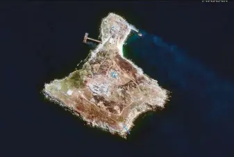  ?? Maxar Technologi­es ?? This satellite image shows an overview of Snake Island in the Black Sea on Thursday after Russian forces withdrew from the strategic site, easing the threat to the port city of Odessa.