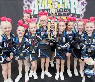  ??  ?? The “Lightning” team from Storm Elite All Stars won the mini level one division state championsh­ip. They are (from left) Emma Brown, Milly Brain, Cordelia Worrall, Olivia Rhodes, Addison Heenan, Lily Boyce, Nakita Marriott, Caitlyn Beale, Mikayla...