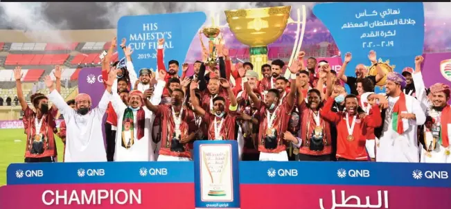  ??  ?? Dhofar players celebrate after defeating Al Arouba in the final of the 48th edition of His Majesty’s Cup Football Championsh­ip at the Rustaq Sports Complex on Sunday. Dhofar won 5-4 in a penalty shootout after the teams remained goalless even after extra-time