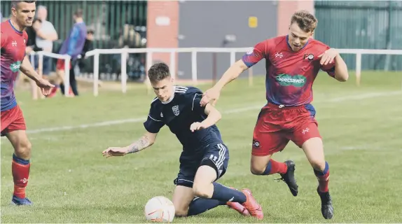  ??  ?? Washington United (blue), in action against FC Hartlepool last weekend, are looking for a win at Horden on Saturday.