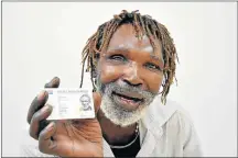  ?? Picture: EUGENE COETZEE ?? VICTORY AT LAST: Reginald Sothomela, 69, shows off his new South African ID card