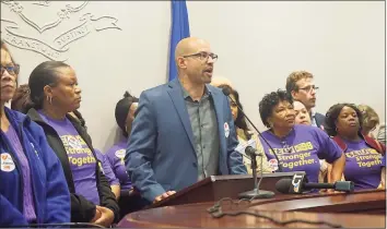  ?? Emilie Munson / Hearst Connecticu­t Media file photo ?? Rob Baril, president of SEIU 1199 New England, stood with nursing home workers who came to the state Capitol in Hartford on Saturday.