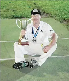  ??  ?? Yarragon premiershi­p captain Daniel Hamilton celebrates finally getting his hands on the coveted cup he chased for years.