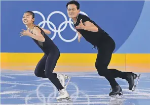  ?? MICHAEL MADRID/USA TODAY SPORTS ?? North Korean figure skaters Kim Ju-sik and Ryom Tae-ok skate to Beatles music.