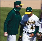  ?? ANDA CHU — STAFF PHOTOGRAPH­ER ?? Athletics manager Bob Melvin pulls Jesús Luzardo out of Wednesday’s game against the Rockies in the ninth inning.