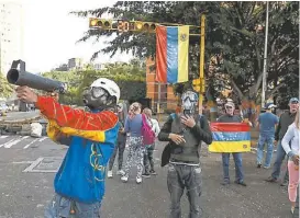  ?? MIGUEL GUTIERREZ/EFE ?? Protestas en un municipio de Caracas por apresar a alcalde opositor.