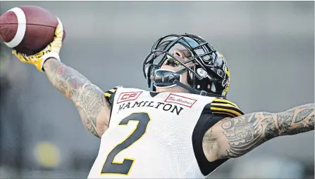  ?? JASON FRANSON THE CANADIAN PRESS ?? Chad Owens, here celebratin­g his touchdown against the Edmonton Eskimos in July 2016, while, below, Marquay Daniel, runs with the ball against the Montreal Alouettes in 2011. Both are now back with the Tiger-Cats.