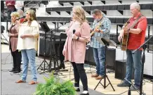  ??  ?? A band from The Ridge Church provided the special music for the 2021 Baccalaure­ate ceremony Friday in Blackhawk Arena. Band members are Jerry Fitzner, Charie Snyder, Lorrie Merritt, Amy Jasay, Emily Marler, Cassie Dunn, Pam Cecil and Juie Austin. Sound was managed by Chase Marler and Jason Dunn. The Ridge Church youth pastors Cody and Tiffany Keene spoke at the 2021 Baccalaure­ate ceremony. The main speaker was Patrick Meador, youth pastor of First Baptist Church.