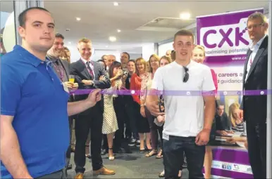  ??  ?? Cutting the ribbon at the opening of the CXK base in the old Ashford magistrate­s court in 2014 are Rob Latham, left, Tom Lord, centre, and then chief executive, Sean Kearns, right