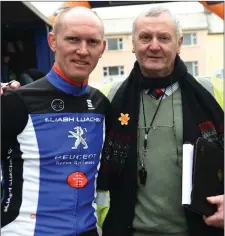  ??  ?? Eugene Moriarty completing his 21st Ras Mumhan with his father Tadhg in Killorglin on Monday.