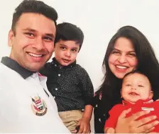  ??  ?? Pranay Sharma with his wife and children.