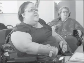  ?? Colleen De Neve/calgary Herald ?? Terena Denham, left, spoke Thursday about the concern she and other residents of the Dr. Fanning Centre have about the number of baths residents receive each week.