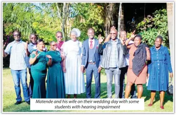  ?? ?? Matende and his wife on their wedding day with some students with hearing impairment