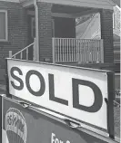  ?? AL BEHRMAN/AP ?? In this 2009 photo, a sold sign is posted outside a home in Cincinnati. Nationwide, home resales are up 9 percent from January, on a seasonally adjusted basis, while new home sales have climbed 17 percent.