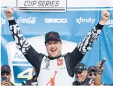  ?? CHRIS GRAYTHEN/GETTY ?? Kurt Busch, driver of the #45 Jordan Brand Toyota, celebrates after winning the NASCAR Cup Series race at Kansas Speedway on Sunday.