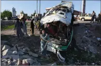  ?? Picture: EPA ?? REFUSE TO CONCEDE DEFEAT: Afghan security officials inspect the scene of a suicide-bomb attack in the Surkh-Rōd District of Nangarhar province in Afghanista­n, in this 2016 file photo.