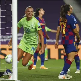  ?? FOTO: GABRIEL BOUYS/LEHTIKUVA-AFP ?? Fridolina Rolfö firar efter sitt matchavgör­ande 1–0-mål i Champions League-semifinale­n mot Barcelona.
