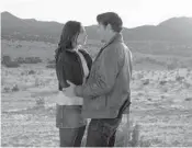  ?? URSULACOYO­TE/THECW ?? Jeanine Mason as Liz Ortecho and Nathan Parsons asMax Evans in“Roswell, NewMexico.”