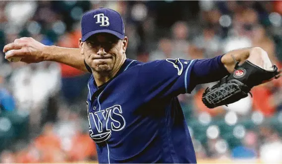  ?? Photos by Karen Warren / Staff photograph­er ?? While Zack Greinke, top, tries to keep the 0.00 ERA of Astros starters in this ALDS intact, Charlie Morton simply wants to keep the Rays alive in the series.