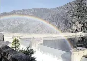  ?? JOHN HOLLAND Modesto Bee File ?? A rainbow forms in the mist from water releases at Hetch Hetchy Reservoir, owned by San Francisco.