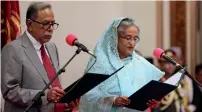  ?? Reuters ?? president abdul hamid administer­s sheikh hasina’s oath taking ceremony as the country’s prime minister in dhaka. —