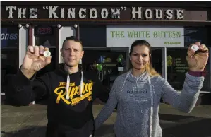  ?? Photo by John Reidy ?? Peter and Agata Michno outside their new venture, The White Button Sewing Service after its recent launch.