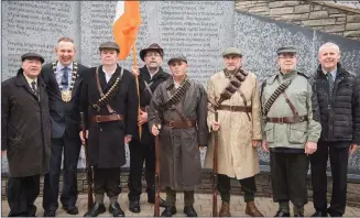  ?? Photo supplied by Lusk Community Council ?? ‘Volunteers’ of Lusk Community Council with Mayor of Fingal Darragh Butler and Fingal County Councillor­s at the 1916 memorial beside the Carnegie Library, where the great Kerry patriot Tomás Ághas. The community are now planning a major celebratio­n of...