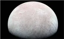  ?? ?? This image provided by NASA, processed by Kevin M. Gill, shows Jupiter’s moon Europa captured by the Juno spacecraft on Sept. 29, 2022, with north to the left. (AP)
