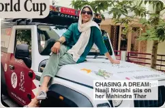  ?? ?? CHASING ADREAM: Naaji Noushi sits on her Mahindra Thar