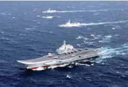  ?? REUTERSPIX ?? The Liaoning and accompanyi­ng vessels conduct a drill in South China Sea in this undated photo taken last month.