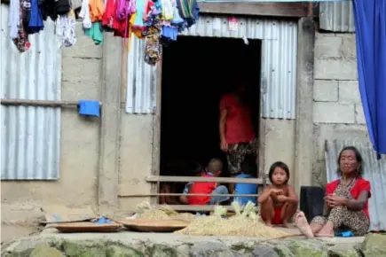  ?? Photo by Milo Brioso ?? HIGHLAND RICE . Buscalan residents take pride in the production of the unoy rice which is consumed only within their community. The village has became a tourist destinatio­n after Whang-od, the oldest Kalinga traditiona­l tattoo artist became popular.