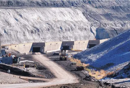  ?? JON AUSTRIA/FARMINGTON DAILY TIMES ?? A service road leads to entrance portals at the San Juan Mine in northweste­rn New Mexico. The mine, run by the Westmorela­nd Coal Co., supplies the San Juan Generating Station’s coal-fired plants.