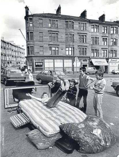  ??  ?? Some young fun-seekers are for the high jump in Glasgow’s Maryhill in1980, main, and, left, pupils at Avenue End primary hop to it last week
