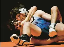  ?? APRIL GAMIZ/THE MORNING CALL ?? Nazareth’s Cade Campbell wrestles Northampto­n’s Austin Noe in the 152-pound weight class on Wednesday during a wrestling match in Northampto­n.