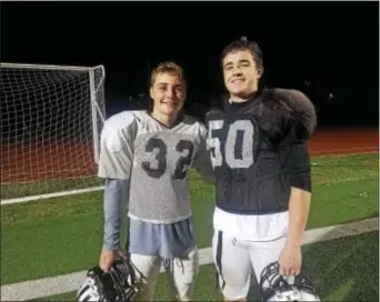  ??  ?? Strath Haven linebacker­s Ethan Belville, left, and Ryan Morris have fueled a dogged defense that has propelled the Panthers to the quarterfin­als of the District 1 Class 5A tournament. The No. 11 seed Panthers take on No. 3 Unionville Friday night.