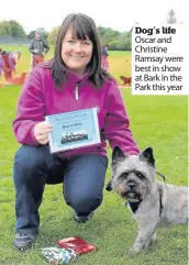  ??  ?? Dog’s life Oscar and Christine Ramsay were best in show at Bark in the Park this year