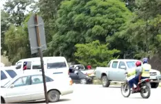  ??  ?? A police motorbike pursues a fleeing unregister­ed pirate kombi