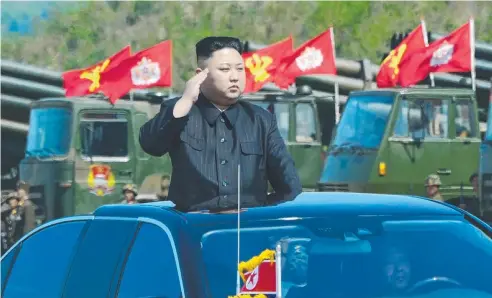  ?? Picture: AFP ?? ENGAGEMENT: Kim Jong-Un attending the combined fire demonstrat­ion of the services of the Korean People's Army.